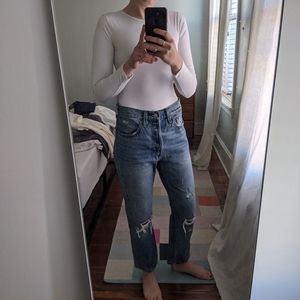 Classic Levi's 501 ripped knee mid wash jeans